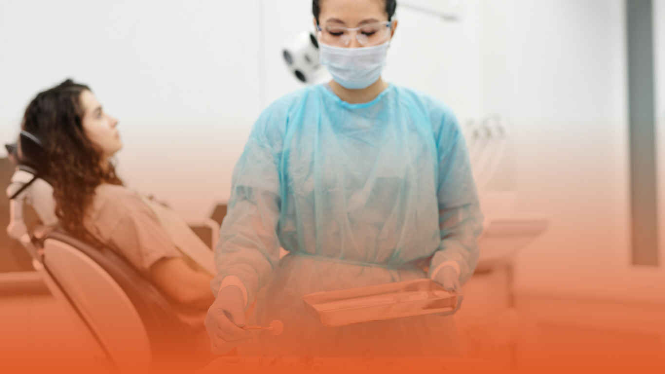 densura-blog-banner-locum-dentist-liability Locum dentist preparing for a procedure: used as a banner in a Densura blog.